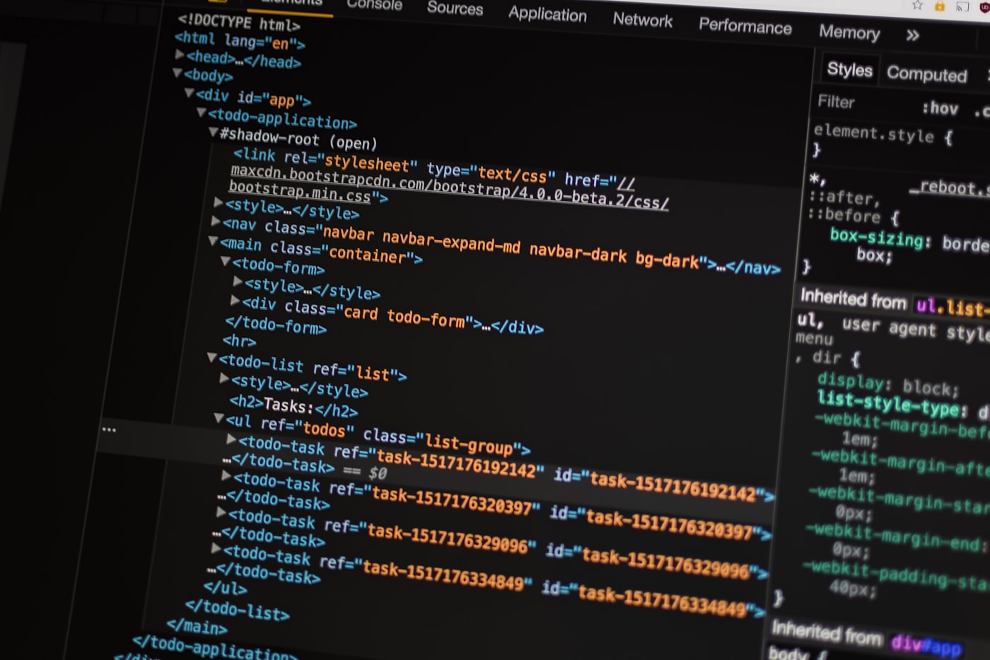 A laptop open to source code